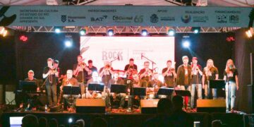 Imigrante celebra o sucesso do Dia Mundial do Rock