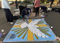 Corpus Christi reúne dezenas de voluntários na confecção de tapetes junto ao Cristo Protetor de Encantado